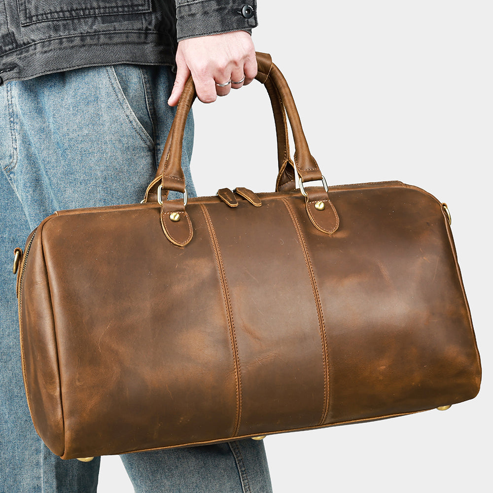 Coffee leather travel duffel, handheld rear exterior view