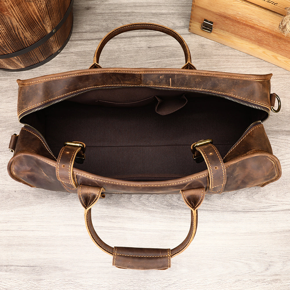Coffee leather weekender holdall bag, empty main compartment view