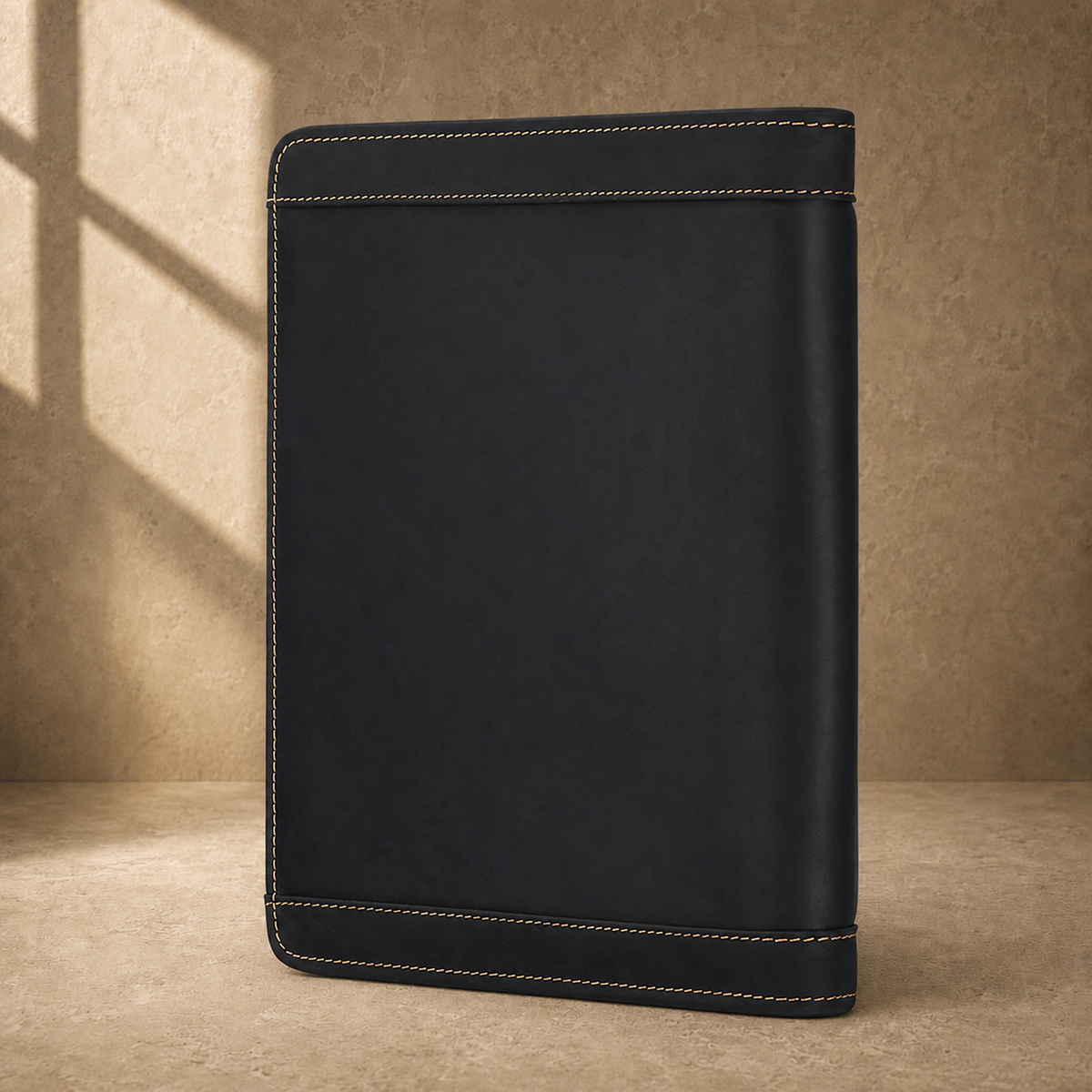 Black crazy-horse leather portfolio side profile view