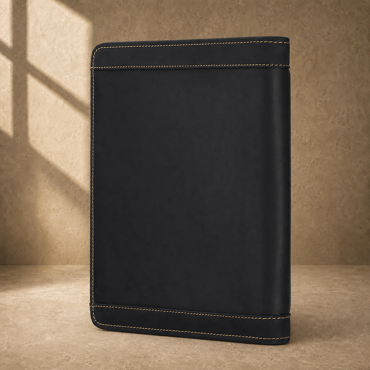 Black crazy-horse leather portfolio side profile view