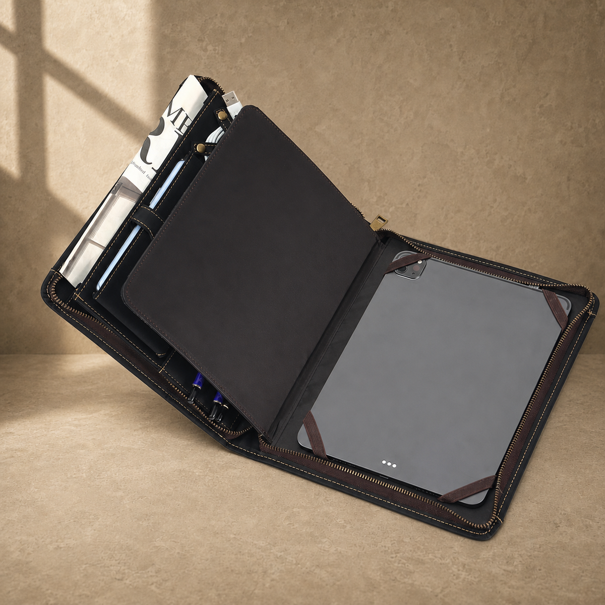 Black crazy-horse leather portfolio packed organizer capacity view