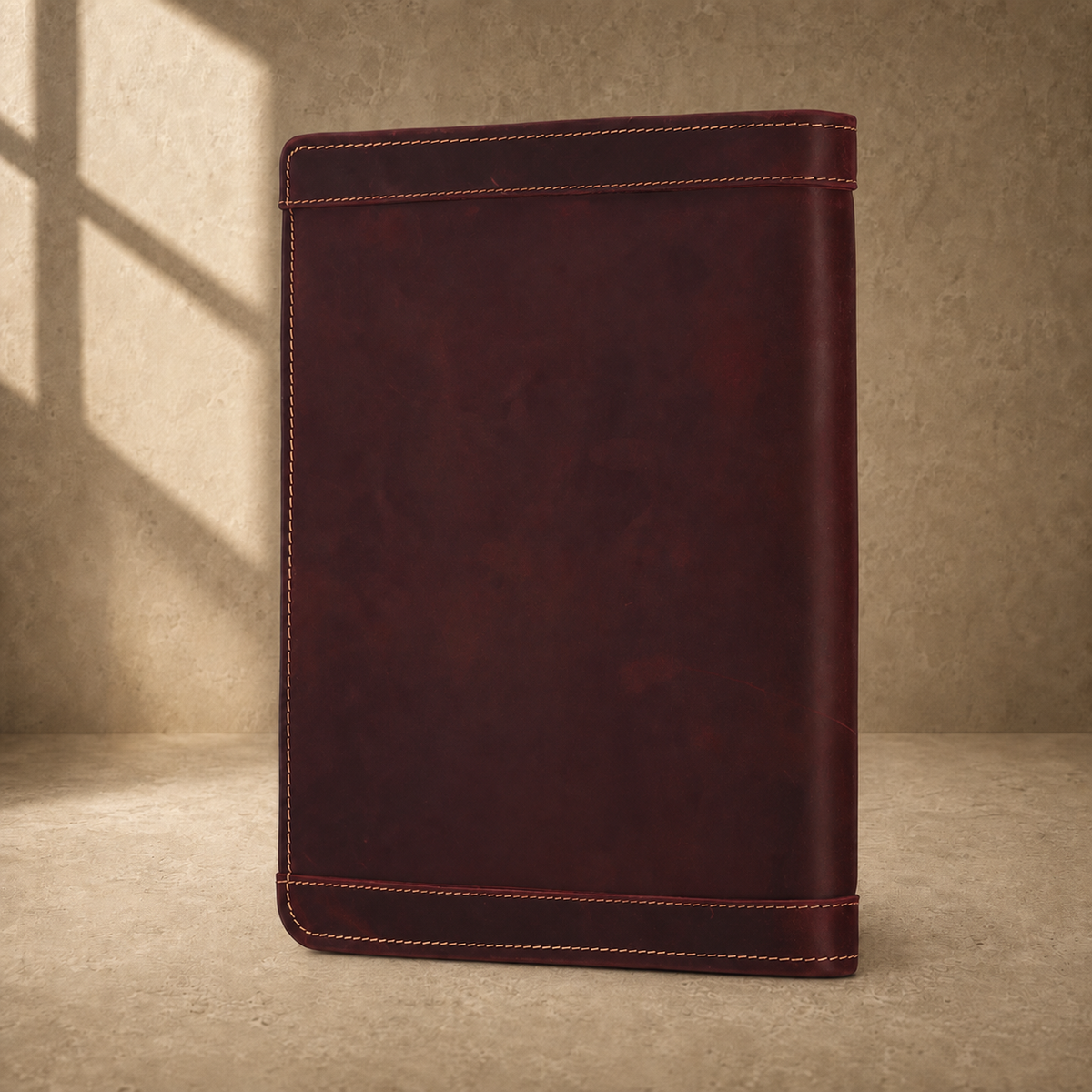 Oxblood leather zip travel portfolio rear three-quarter view