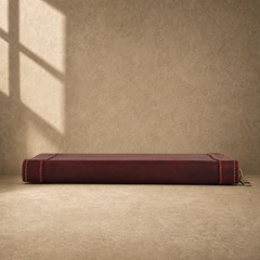 Oxblood leather zip travel portfolio base edge view