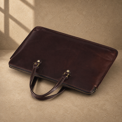 Coffee leather slim laptop briefcase top-down view