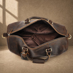 Deep coffee cowhide weekender duffle, empty main compartment view