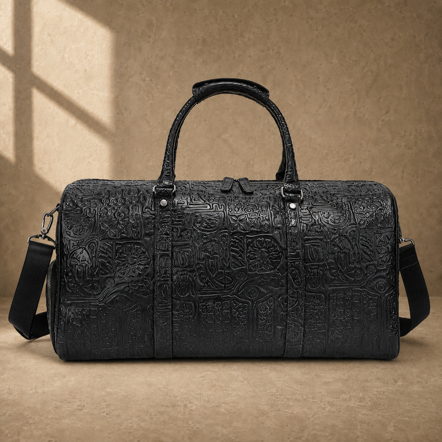 Black embossed leather travel duffel, straight front hero view