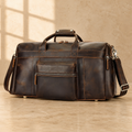 Dark brown cowhide travel duffel bag, front exterior view