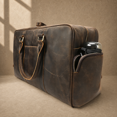 Deep coffee leather weekender duffel, side pocket capacity view