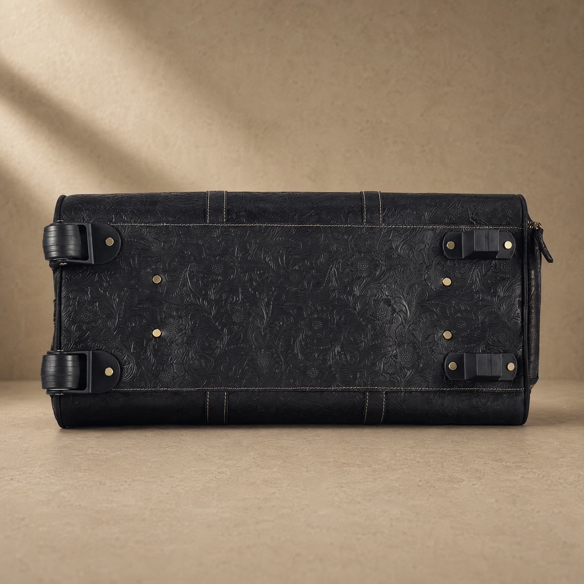Black Embossed Rolling Travel Duffle