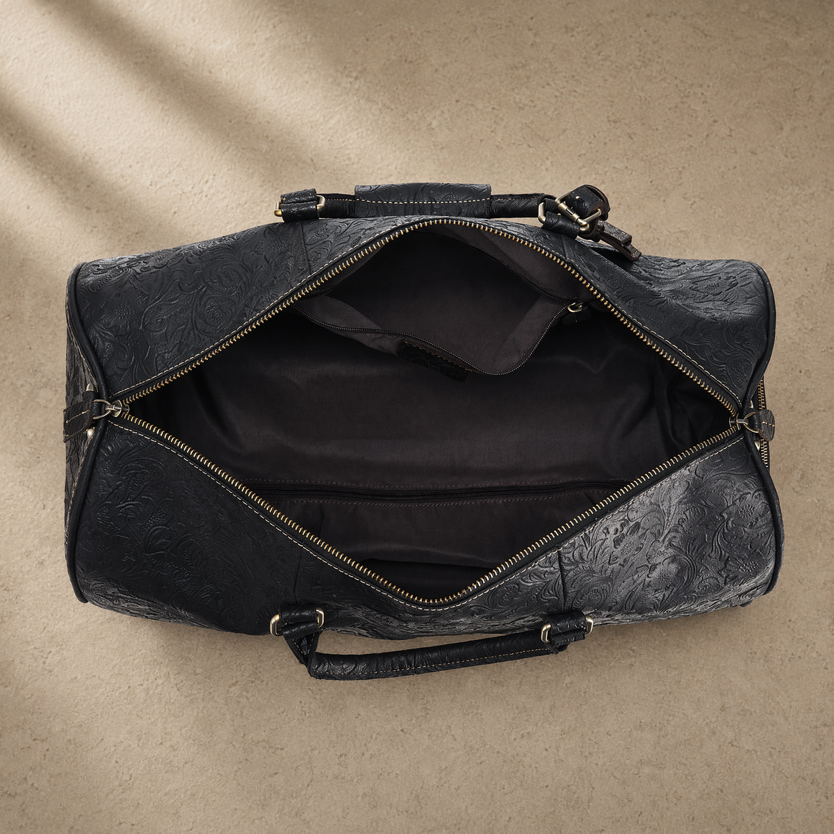 Black Embossed Rolling Travel Duffle