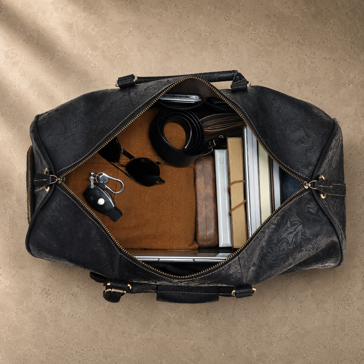 Black Embossed Rolling Travel Duffle