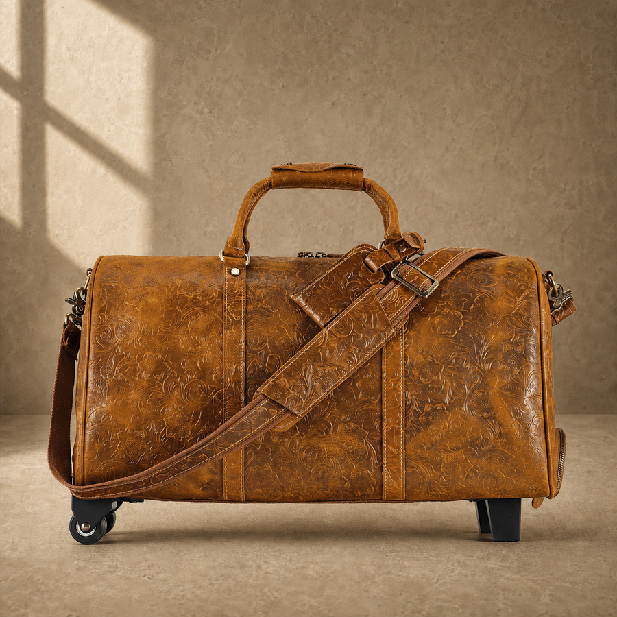 Cognac floral leather rolling duffle with shoulder strap, front view