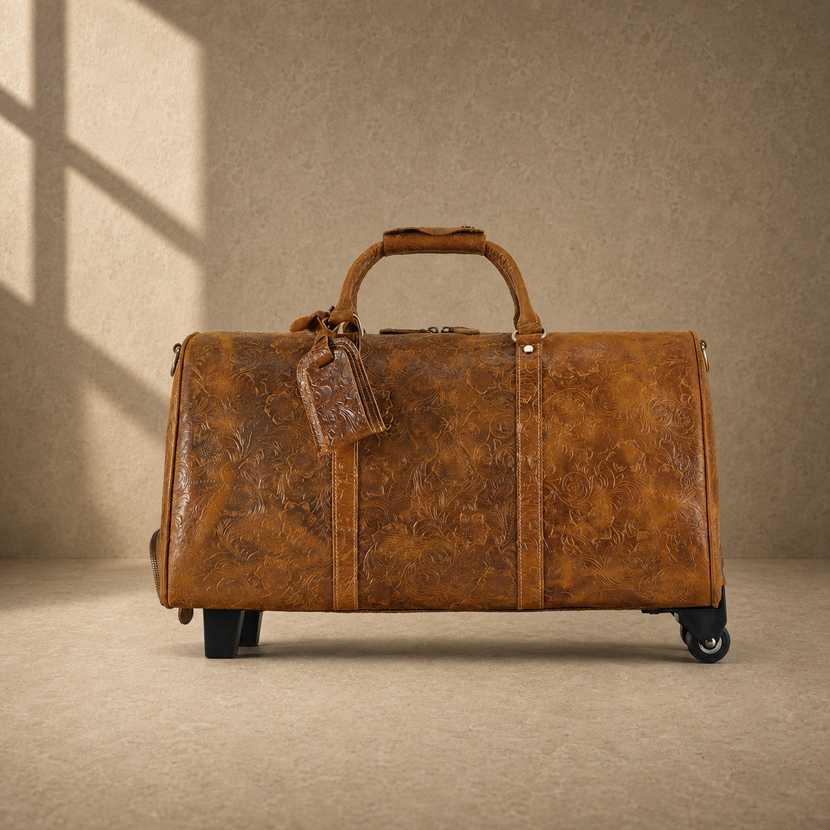 Cognac floral leather roller duffle, clean front profile