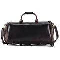 Front view of the Envoy rolling garment weekender in red-oiled brown leather
