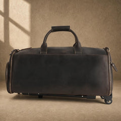 Rear view of dark brown cowhide rolling garment travel bag