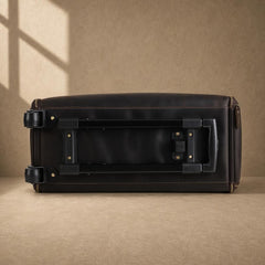 Bottom view of rolling garment bag showing trolley frame and wheels