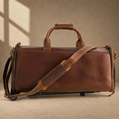 Cognac top-grain cowhide rolling garment travel bag with shoulder strap