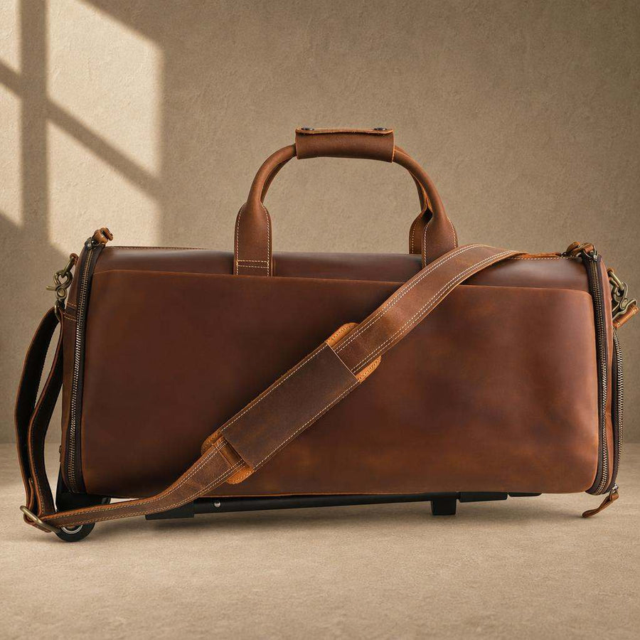 Cognac top-grain cowhide rolling garment travel bag with shoulder strap