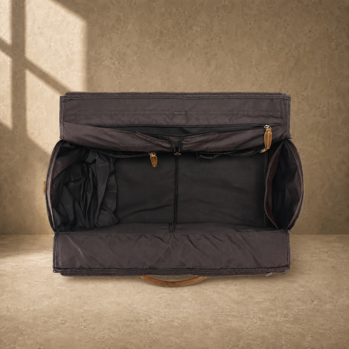 Cognac garment weekender with empty organized interior