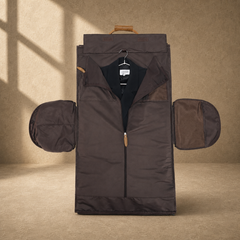 Fold-out cognac garment weekender holding a suit jacket