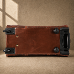 Base view of coffee rolling duffel showing wheels and protective feet