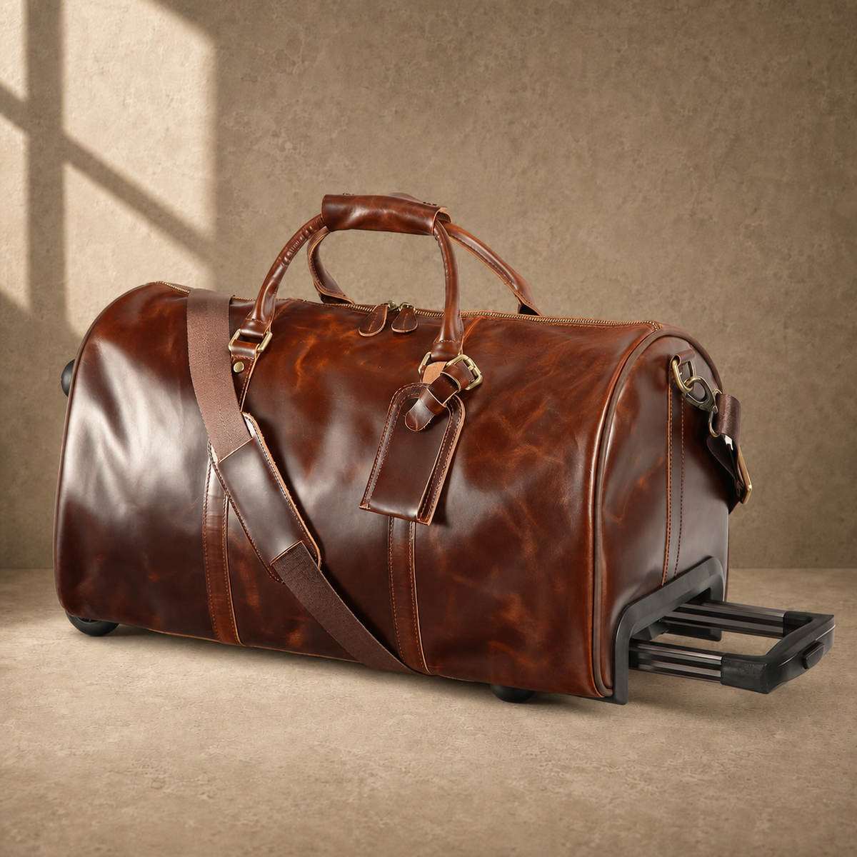 Coffee leather rolling travel duffel, three-quarter view with trolley handle