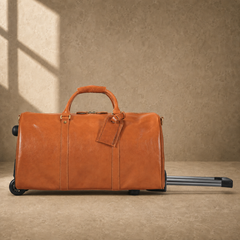 Cognac rolling travel duffel with trolley handle extended
