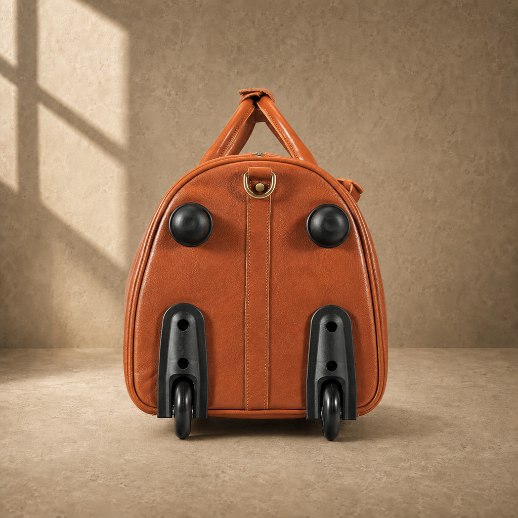 Wheel-end view of cognac leather rolling travel duffel