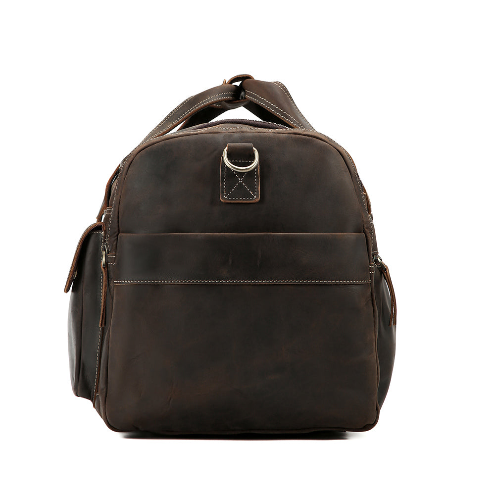 Front view of the Longhaul multi-pocket weekender in coffee leather