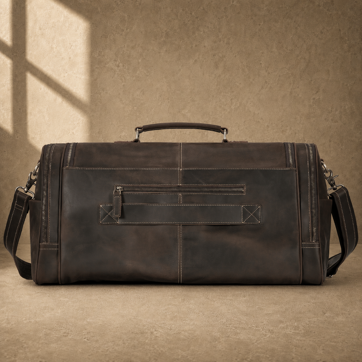 Brown leather business travel duffel, rear view