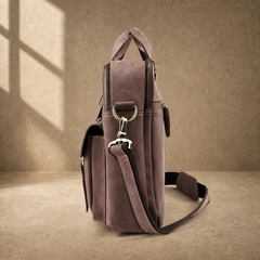 Khaki business briefcase showing side profile and strap hardware