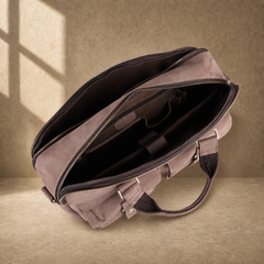 Khaki business briefcase showing empty dual compartment interior