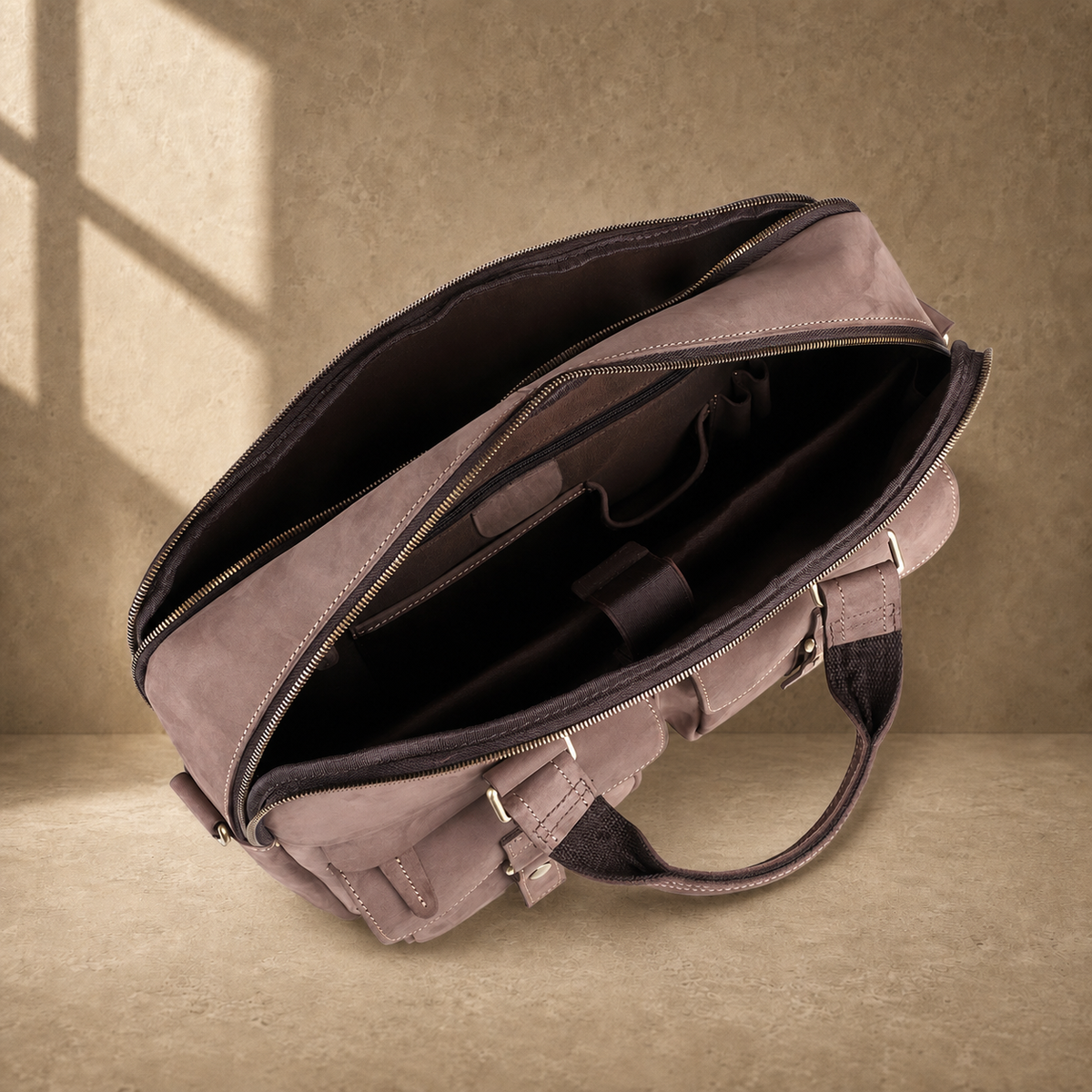 Khaki business briefcase showing empty dual compartment interior