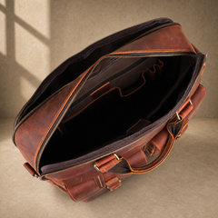 Reddish brown leather work briefcase, open empty compartments