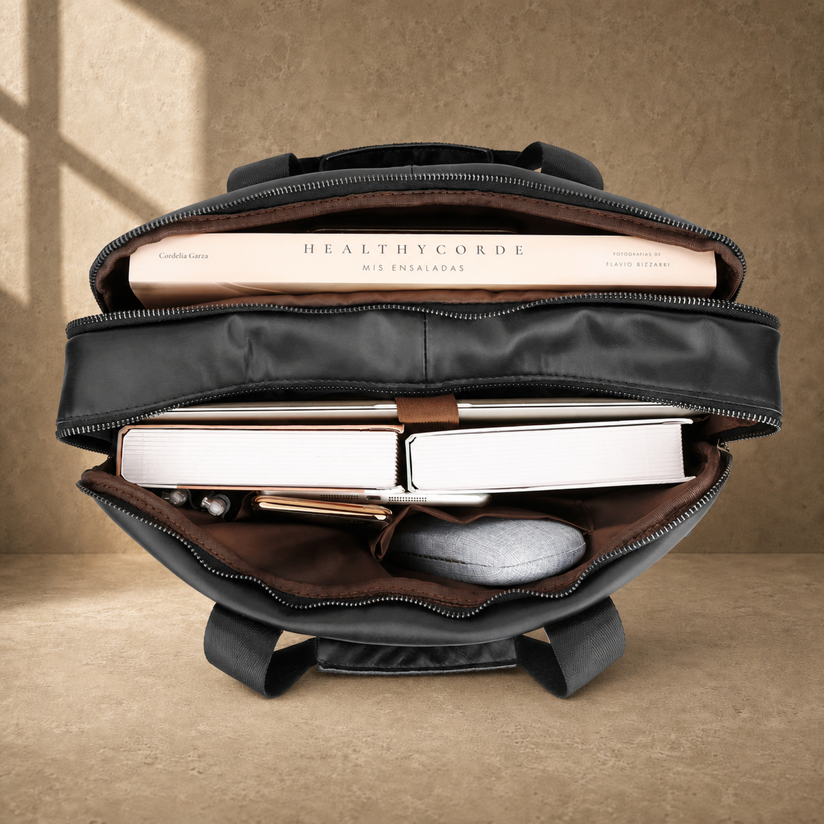 Black leather multi pocket briefcase, packed interior capacity