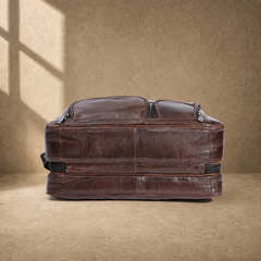 Brown cowhide multi-pocket briefcase reinforced base view