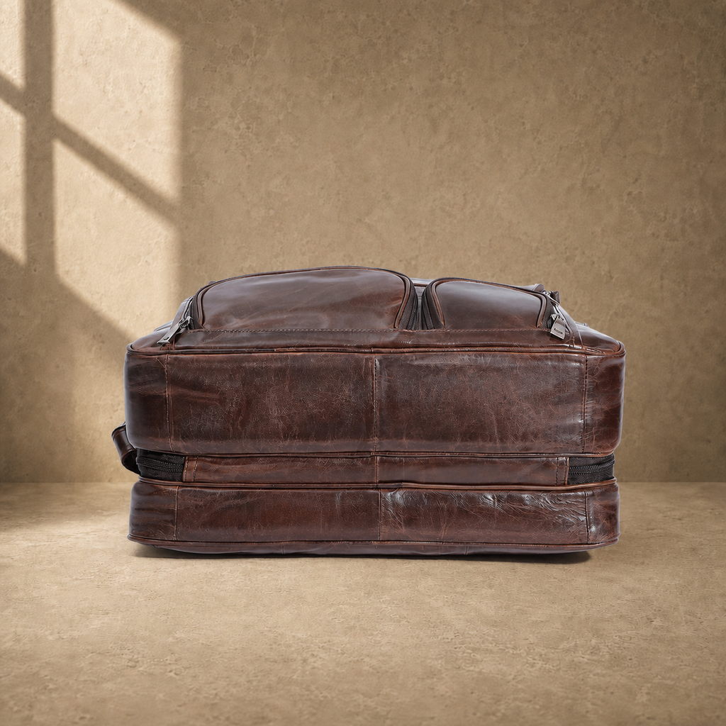 Brown cowhide multi-pocket briefcase reinforced base view