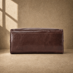 Coffee-brown executive travel duffel, reinforced base view