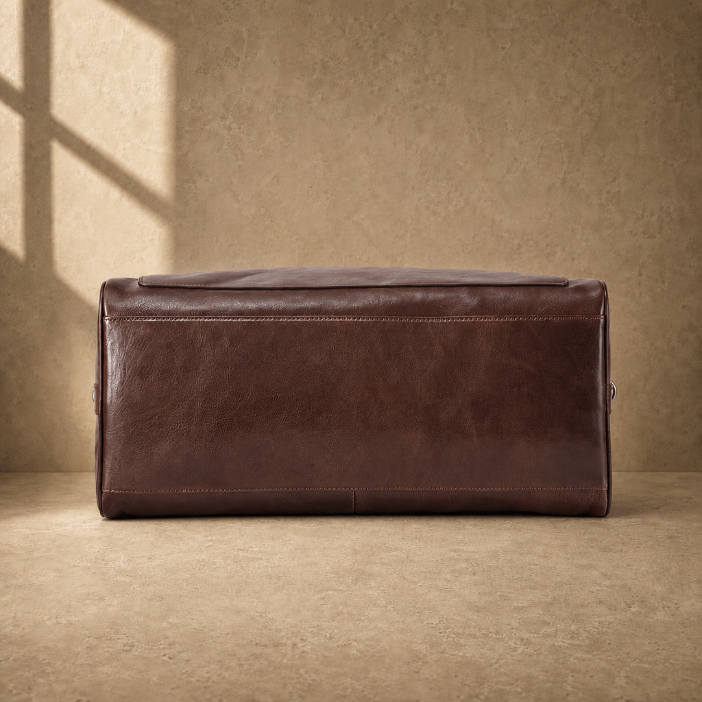 Coffee-brown executive travel duffel, reinforced base view