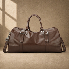 Brown classic overnighter travel bag front view with shoulder strap
