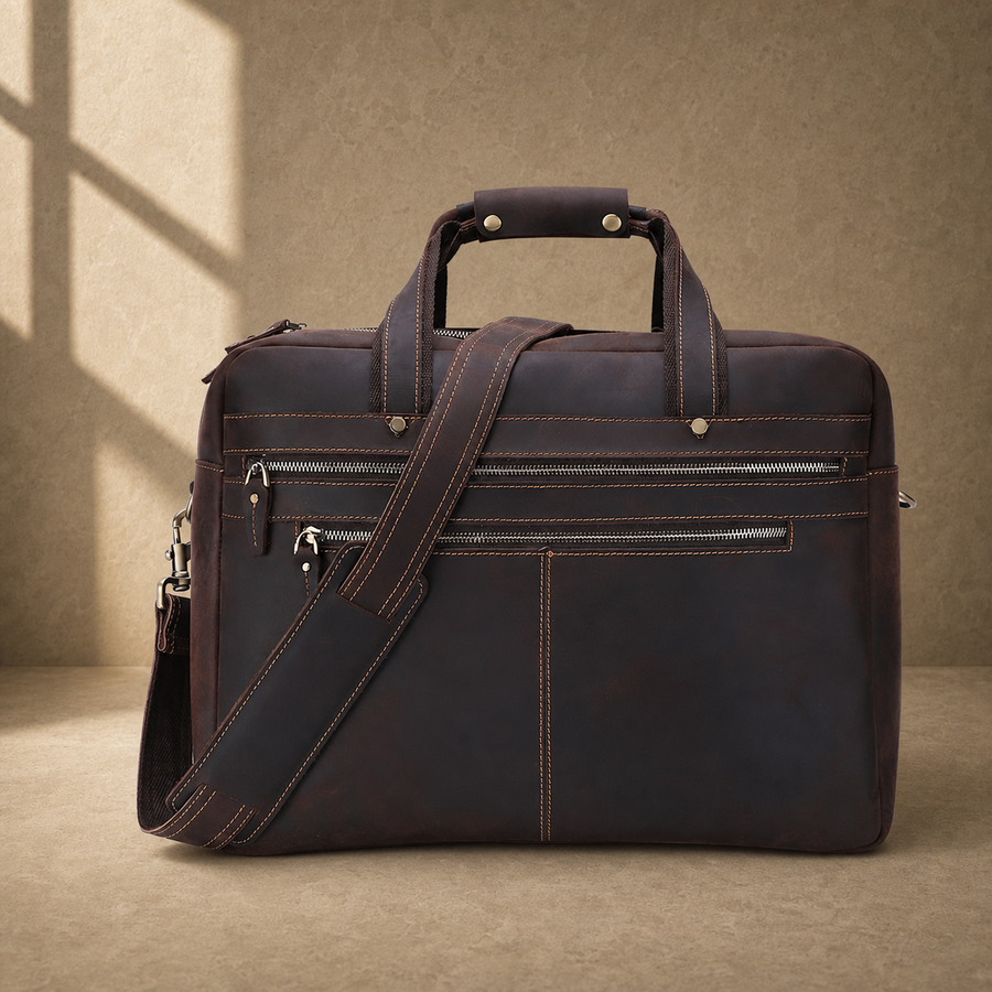 Dark brown cowhide 17-inch briefcase front hero view with shoulder strap