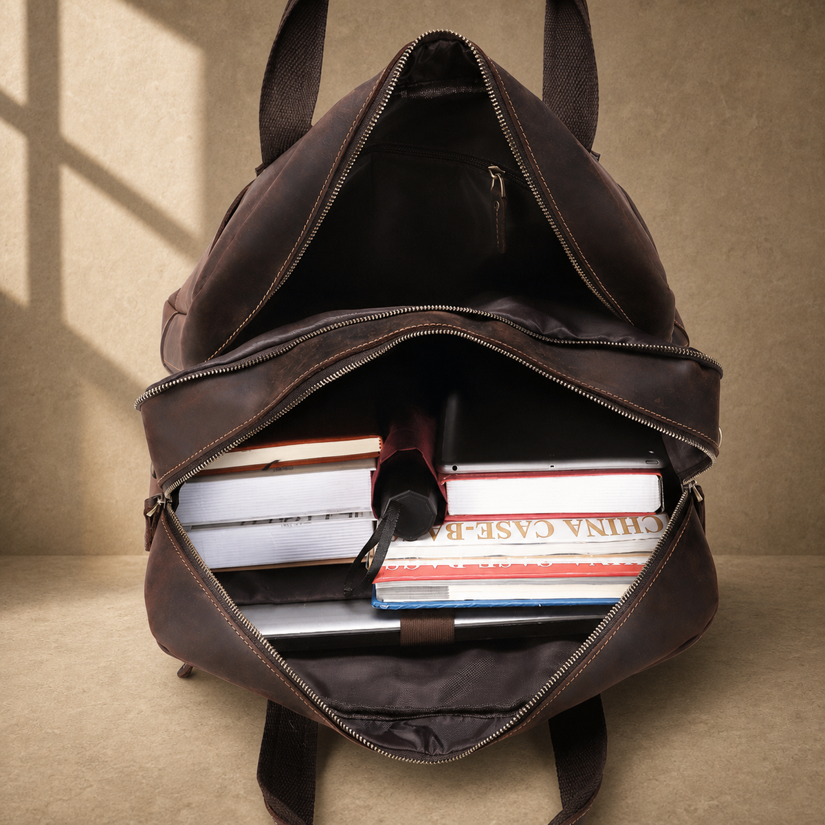 Dark brown cowhide 17-inch briefcase packed capacity view