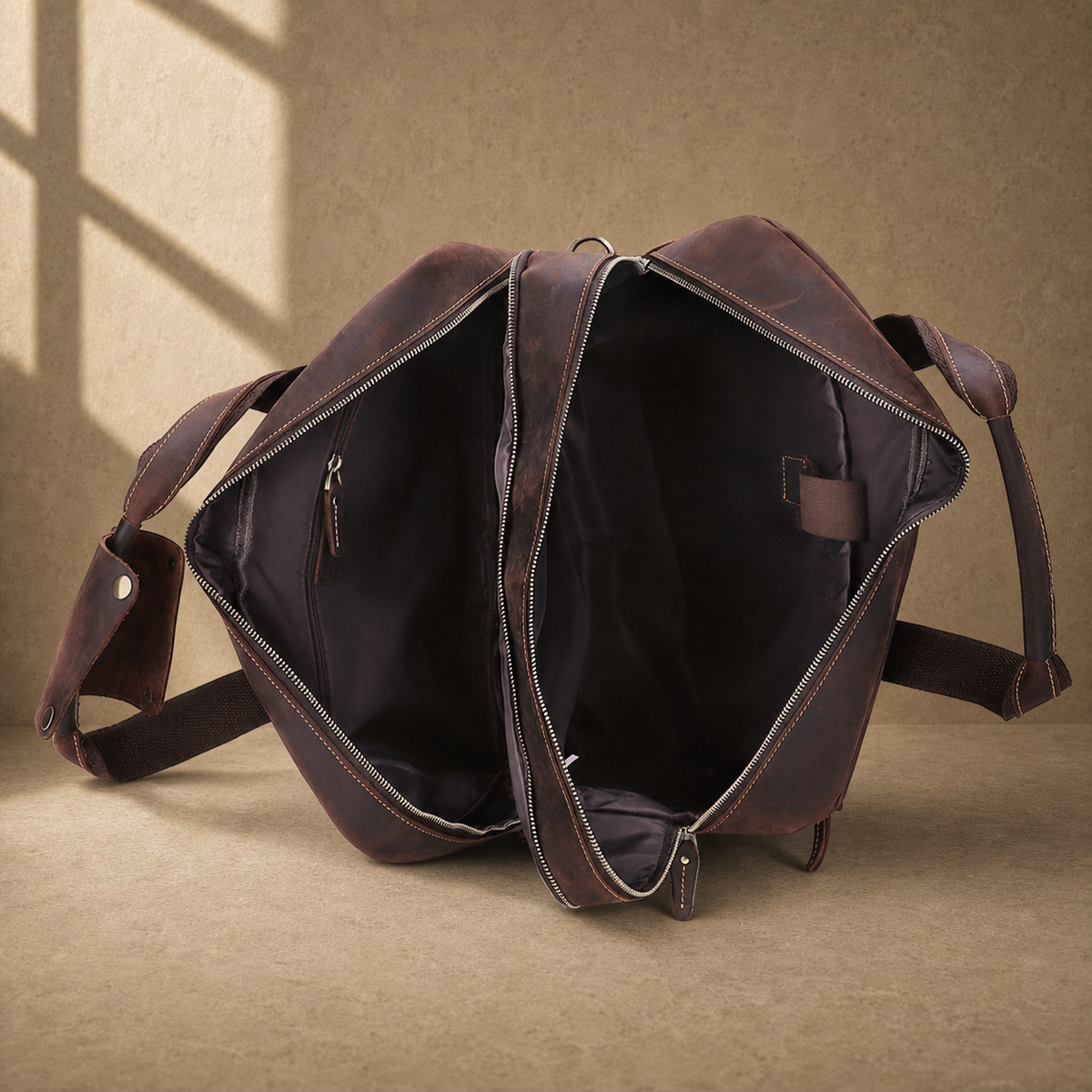 Dark brown cowhide 17-inch briefcase open dual-compartment interior