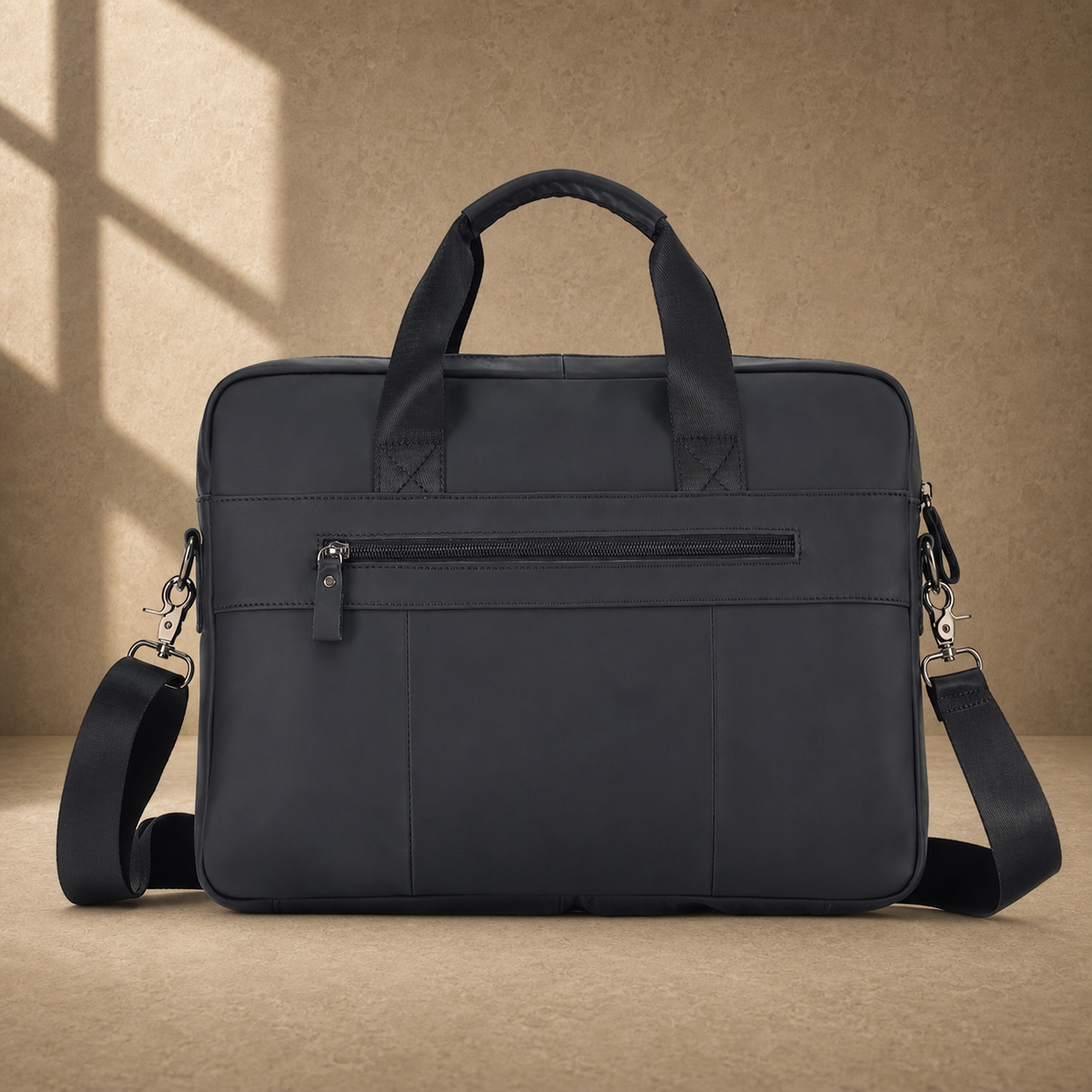 Black smooth leather laptop office briefcase, side profile with strap
