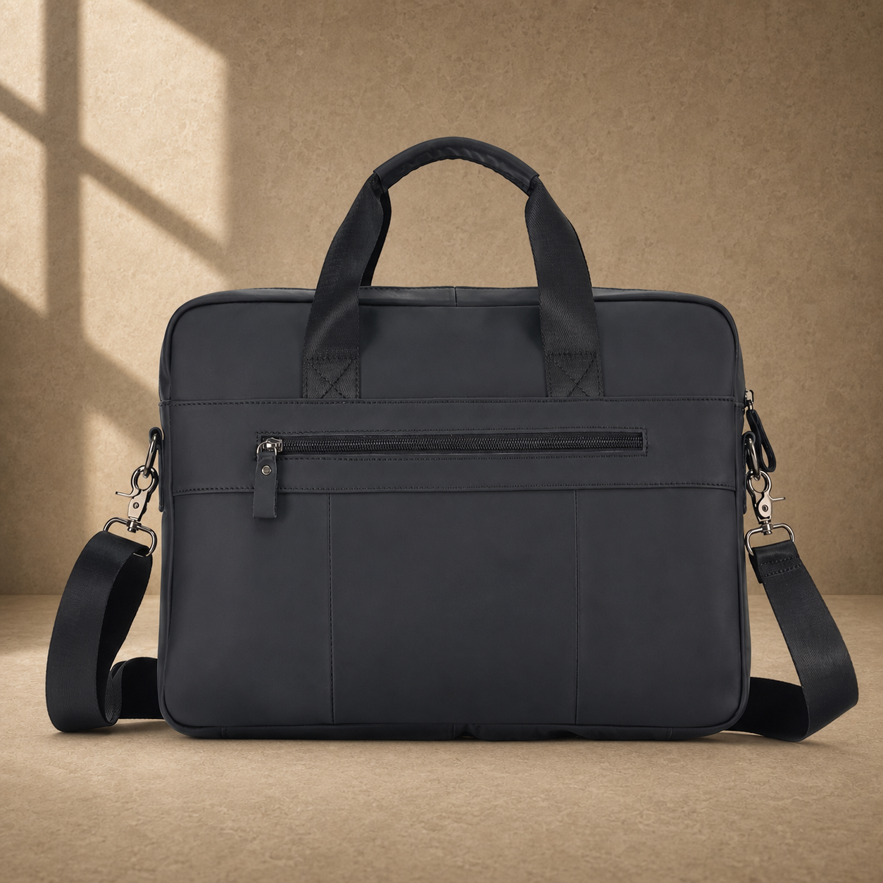 Black smooth leather laptop office briefcase, side profile with strap