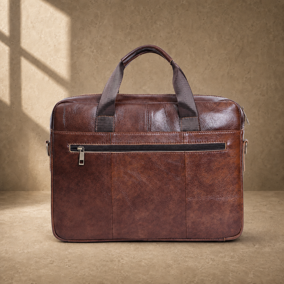 Coffee brown cowhide laptop briefcase rear zip pocket view