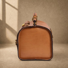 Cognac cowhide structured travel bag, side profile