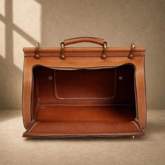 Cognac cowhide structured travel bag with open empty compartment