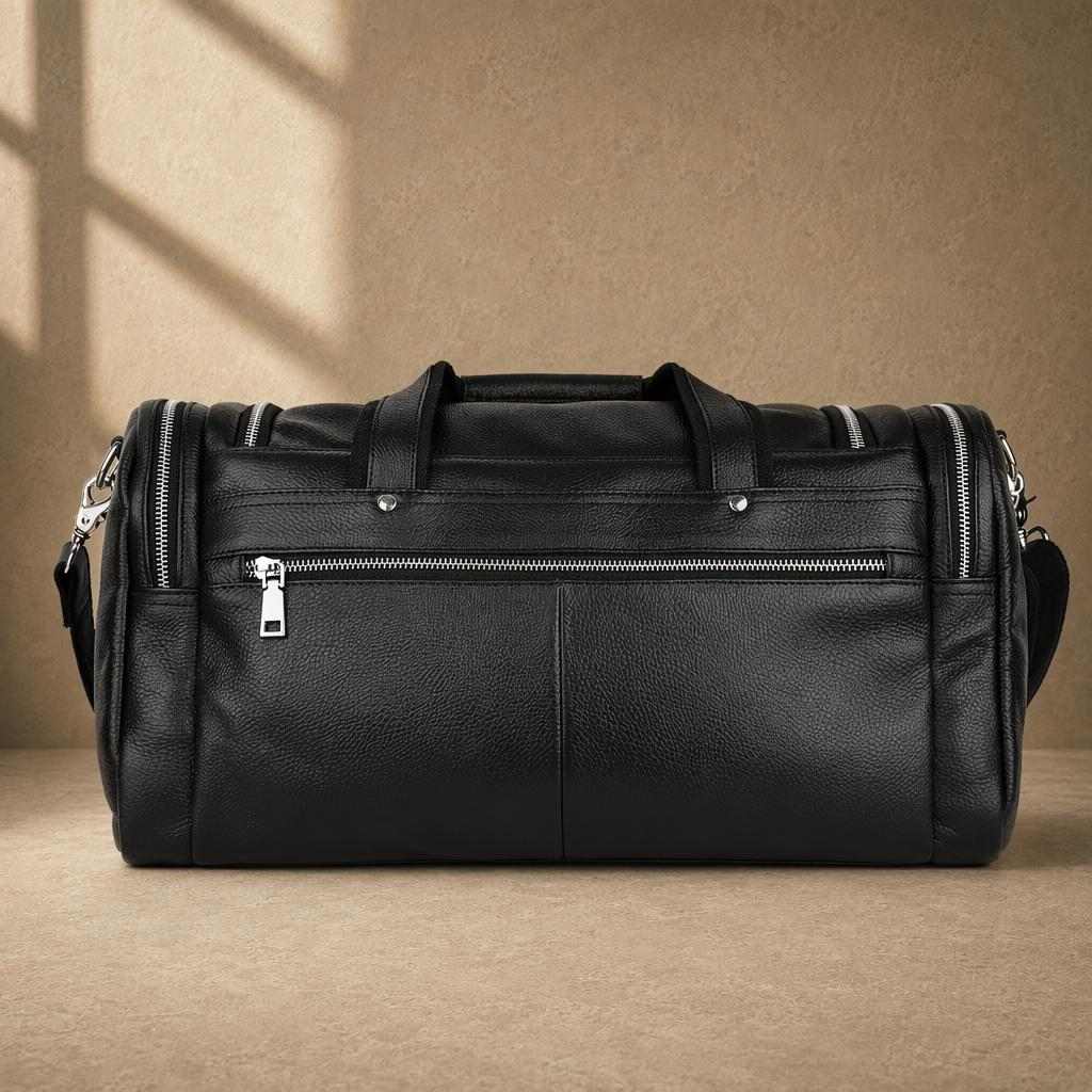 Black pebbled cowhide utility duffel with rear zipper pocket