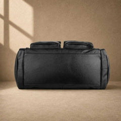 Black pebbled cowhide utility duffel, reinforced base view